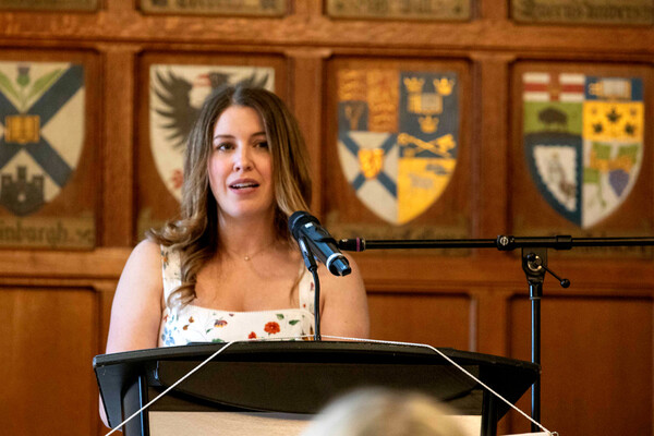 Woman speaking at podium