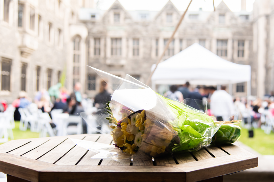 Flowers on table and graduation ceremony