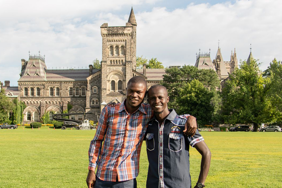 Rashid and Ronald in front of front campus at UofT