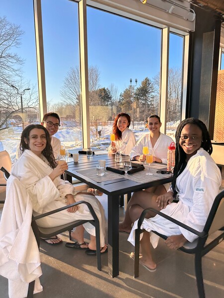 Five residents in robe relax at the spa