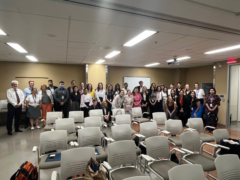 All attendees pose together