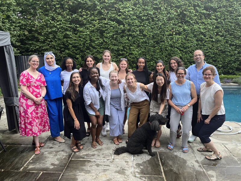 Attendees pose in a group shot