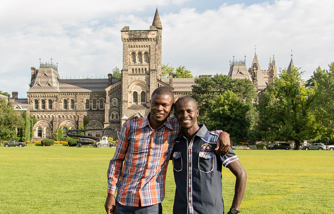 Rashid and Ronald in front of front campus at UofT