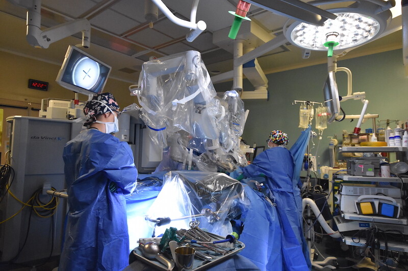 A team of surgeons using the robotic platform