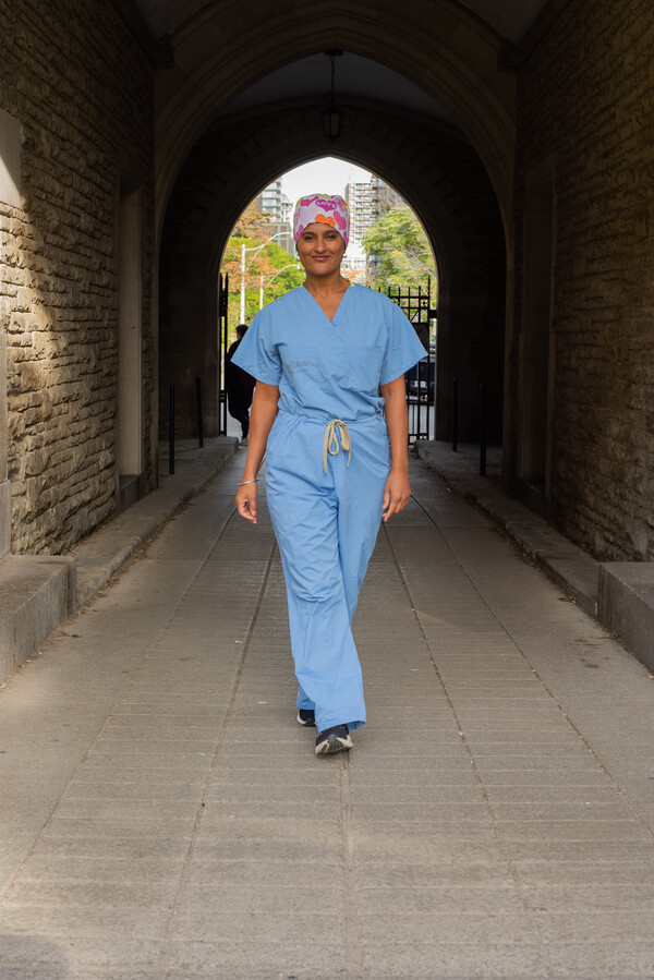 Dr. Roopan Gill walks on campus