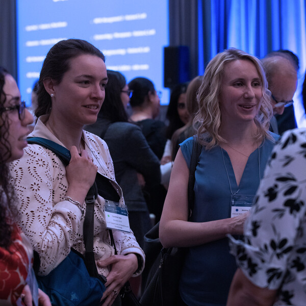 Attendees gathering and chatting